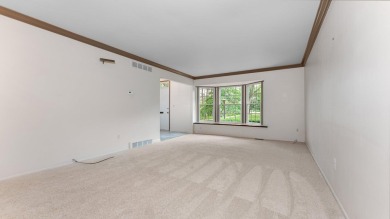 Tucked away in the quiet charm of Georgetown Village--a on Georgetown Country Club in Michigan - for sale on GolfHomes.com, golf home, golf lot