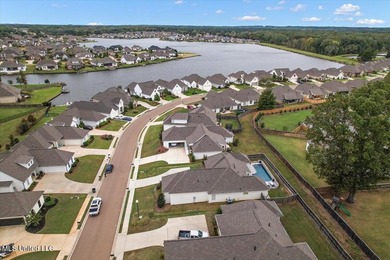Gorgeous 4/3 Home with Pool in Camden of Lake Caroline. Welcome on Lake Caroline Golf Club in Mississippi - for sale on GolfHomes.com, golf home, golf lot