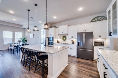 Step into effortless living in this beautiful one-story, located on The Tribute At the Colony in Texas - for sale on GolfHomes.com, golf home, golf lot