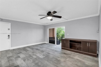 Updated 2 Bedroom 1 Bath with washer and Dryer in unit. Miami on Don Shulas Golf Course and Club in Florida - for sale on GolfHomes.com, golf home, golf lot