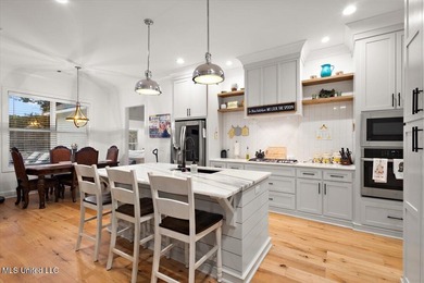 Gorgeous 4/3 Home with Pool in Camden of Lake Caroline. Welcome on Lake Caroline Golf Club in Mississippi - for sale on GolfHomes.com, golf home, golf lot