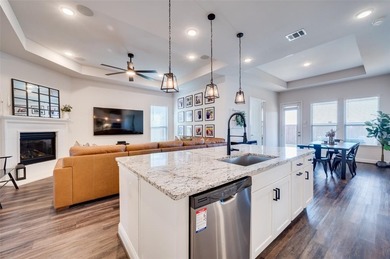 Step into effortless living in this beautiful one-story, located on The Tribute At the Colony in Texas - for sale on GolfHomes.com, golf home, golf lot