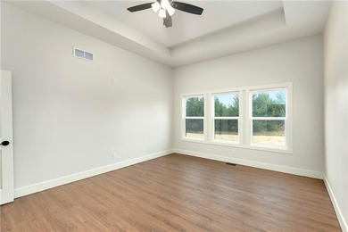 Looking for a high-quality lake home? Come see this newly on Linn Valley Lakes - Deer Trace Golf Course in Kansas - for sale on GolfHomes.com, golf home, golf lot