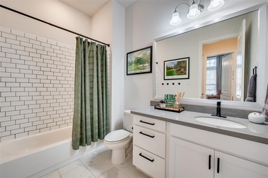 Step into effortless living in this beautiful one-story, located on The Tribute At the Colony in Texas - for sale on GolfHomes.com, golf home, golf lot