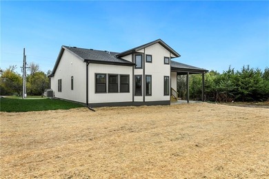 Looking for a high-quality lake home? Come see this newly on Linn Valley Lakes - Deer Trace Golf Course in Kansas - for sale on GolfHomes.com, golf home, golf lot