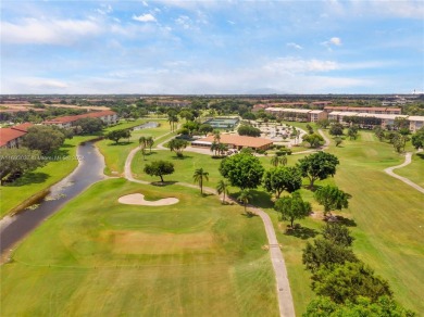 This charming 1-bedroom, 1-bathroom unit is filled with natural on Flamingo Lakes Country Club in Florida - for sale on GolfHomes.com, golf home, golf lot