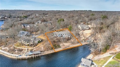 Experience stunning lakefront living on Loch Lomond in this on Bella Vista Country Club - Scottsdale in Arkansas - for sale on GolfHomes.com, golf home, golf lot