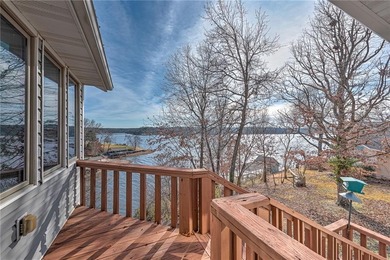 Experience stunning lakefront living on Loch Lomond in this on Bella Vista Country Club - Scottsdale in Arkansas - for sale on GolfHomes.com, golf home, golf lot