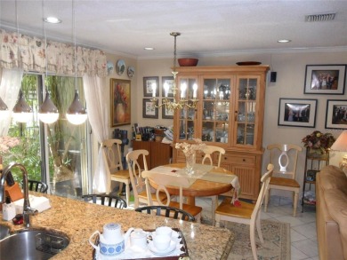 Single-family home in DORAL PARK on a premium lot overlooking on Jim McLean Signature Course in Florida - for sale on GolfHomes.com, golf home, golf lot