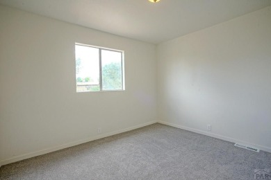 Charming three-bedroom, two-bath home in the heart of Colorado on Hollydot Golf Course in Colorado - for sale on GolfHomes.com, golf home, golf lot