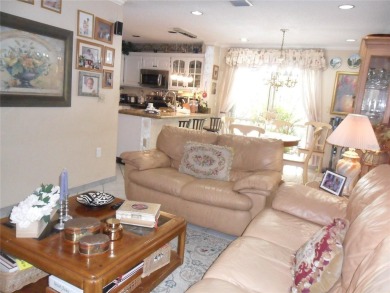 Single-family home in DORAL PARK on a premium lot overlooking on Jim McLean Signature Course in Florida - for sale on GolfHomes.com, golf home, golf lot
