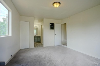 Charming three-bedroom, two-bath home in the heart of Colorado on Hollydot Golf Course in Colorado - for sale on GolfHomes.com, golf home, golf lot
