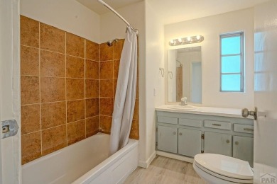 Charming three-bedroom, two-bath home in the heart of Colorado on Hollydot Golf Course in Colorado - for sale on GolfHomes.com, golf home, golf lot