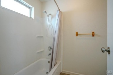 Charming three-bedroom, two-bath home in the heart of Colorado on Hollydot Golf Course in Colorado - for sale on GolfHomes.com, golf home, golf lot