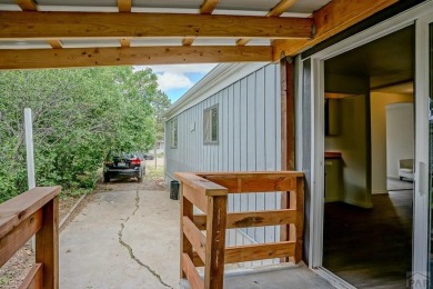Charming three-bedroom, two-bath home in the heart of Colorado on Hollydot Golf Course in Colorado - for sale on GolfHomes.com, golf home, golf lot