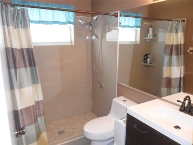 Single-family home in DORAL PARK on a premium lot overlooking on Jim McLean Signature Course in Florida - for sale on GolfHomes.com, golf home, golf lot