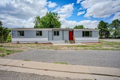 Charming three-bedroom, two-bath home in the heart of Colorado on Hollydot Golf Course in Colorado - for sale on GolfHomes.com, golf home, golf lot
