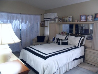 Single-family home in DORAL PARK on a premium lot overlooking on Jim McLean Signature Course in Florida - for sale on GolfHomes.com, golf home, golf lot