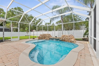 4 BED/2 BATH POOL HOME IN CYPRESS KNOLL! Welcome to 28 Edge Ln on The Grand Club Cypress Course in Florida - for sale on GolfHomes.com, golf home, golf lot