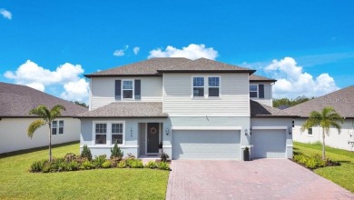 This exquisite waterfront residence, located within the LPGA on LPGA International Golf Course in Florida - for sale on GolfHomes.com, golf home, golf lot