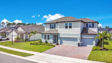 This exquisite waterfront residence, located within the LPGA on LPGA International Golf Course in Florida - for sale on GolfHomes.com, golf home, golf lot