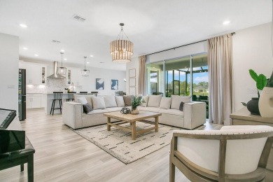This exquisite waterfront residence, located within the LPGA on LPGA International Golf Course in Florida - for sale on GolfHomes.com, golf home, golf lot