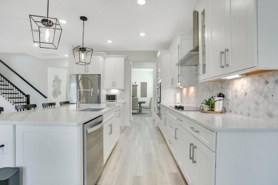 This exquisite waterfront residence, located within the LPGA on LPGA International Golf Course in Florida - for sale on GolfHomes.com, golf home, golf lot