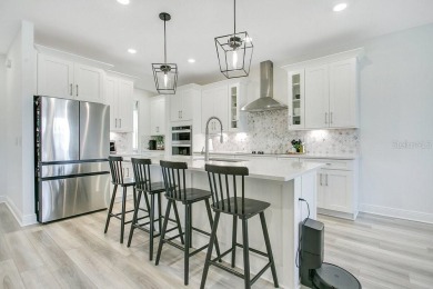 This exquisite waterfront residence, located within the LPGA on LPGA International Golf Course in Florida - for sale on GolfHomes.com, golf home, golf lot