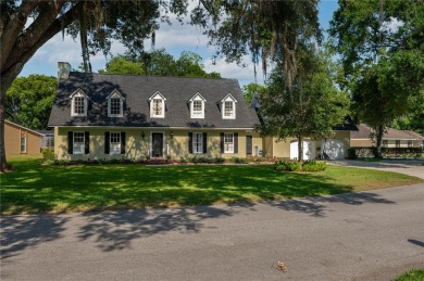 DISCOVER THE SPLENDOR OF THIS HOME in Cypresswood Golf  Country on Cypresswood Golf and Country Club in Florida - for sale on GolfHomes.com, golf home, golf lot