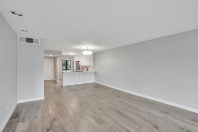 All ages community, this spacious 2-bedroom, 2-bath corner unit on  in Florida - for sale on GolfHomes.com, golf home, golf lot