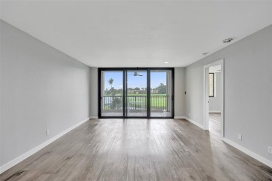 All ages community, this spacious 2-bedroom, 2-bath corner unit on  in Florida - for sale on GolfHomes.com, golf home, golf lot