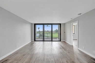 Located in an all-ages community, this spacious 2-bedroom on Fountains Golf and Country Club in Florida - for sale on GolfHomes.com, golf home, golf lot