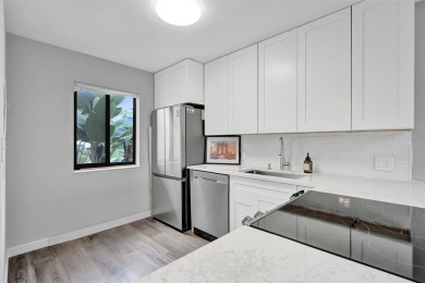 All ages community, this spacious 2-bedroom, 2-bath corner unit on  in Florida - for sale on GolfHomes.com, golf home, golf lot