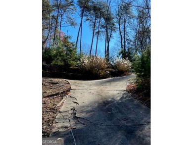 Beautiful lot ready to build on.  Slab and driveway already in on The Highlands Course at Lake Arrowhead in Georgia - for sale on GolfHomes.com, golf home, golf lot