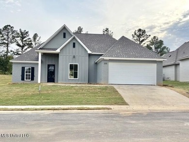 Gorgeous New Construction in Pinehurst of Lake Caroline! Come on Lake Caroline Golf Club in Mississippi - for sale on GolfHomes.com, golf home, golf lot