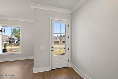 Gorgeous New Construction in Pinehurst of Lake Caroline! Come on Lake Caroline Golf Club in Mississippi - for sale on GolfHomes.com, golf home, golf lot