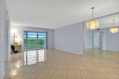 This top-floor condo is situated in Wynmoor's golf community and on Wynmoor Golf Course in Florida - for sale on GolfHomes.com, golf home, golf lot