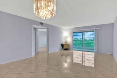 This top-floor condo is situated in Wynmoor's golf community and on Wynmoor Golf Course in Florida - for sale on GolfHomes.com, golf home, golf lot