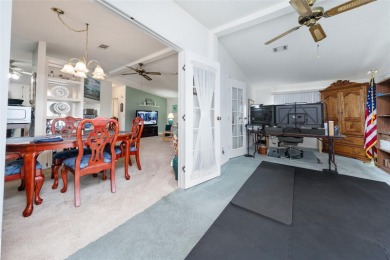 Welcome home to this charming 2-bedroom, 2 bath manufactured on El Diablo Executive Golf Course in Florida - for sale on GolfHomes.com, golf home, golf lot