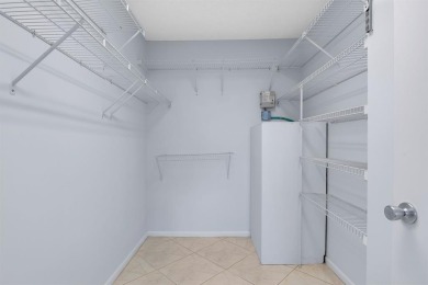This top-floor condo is situated in Wynmoor's golf community and on Wynmoor Golf Course in Florida - for sale on GolfHomes.com, golf home, golf lot