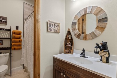 Stunning 2023 custom one-story home on a beautifully treed on Cedar Creek Country Club in Texas - for sale on GolfHomes.com, golf home, golf lot