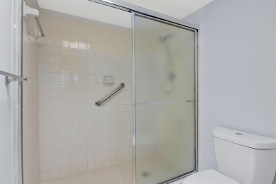 This top-floor condo is situated in Wynmoor's golf community and on Wynmoor Golf Course in Florida - for sale on GolfHomes.com, golf home, golf lot