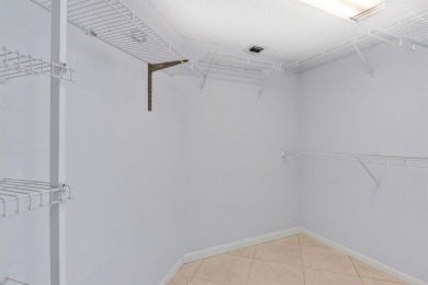 This top-floor condo is situated in Wynmoor's golf community and on Wynmoor Golf Course in Florida - for sale on GolfHomes.com, golf home, golf lot