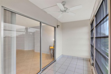 This top-floor condo is situated in Wynmoor's golf community and on Wynmoor Golf Course in Florida - for sale on GolfHomes.com, golf home, golf lot