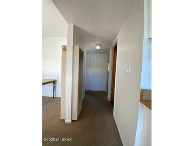 Central Tucson Co-op! This upstairs 2-bedroom, 1-bath unit on Randolph Park Golf Courses in Arizona - for sale on GolfHomes.com, golf home, golf lot