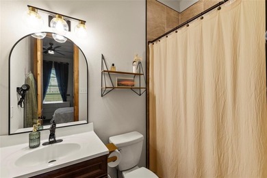 Stunning 2023 custom one-story home on a beautifully treed on Cedar Creek Country Club in Texas - for sale on GolfHomes.com, golf home, golf lot