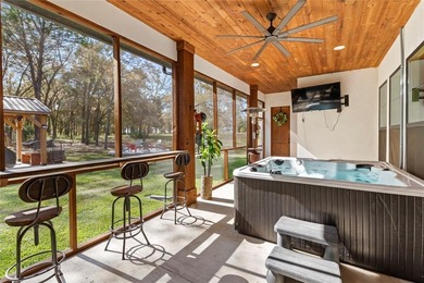 Stunning 2023 custom one-story home on a beautifully treed on Cedar Creek Country Club in Texas - for sale on GolfHomes.com, golf home, golf lot