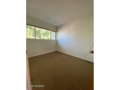 Central Tucson Co-op! This upstairs 2-bedroom, 1-bath unit on Randolph Park Golf Courses in Arizona - for sale on GolfHomes.com, golf home, golf lot