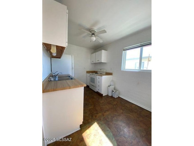 Central Tucson Co-op! This upstairs 2-bedroom, 1-bath unit on Randolph Park Golf Courses in Arizona - for sale on GolfHomes.com, golf home, golf lot