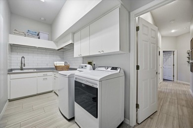 Welcome to this exceptional Costanza custom-built home on Tarpon Woods Golf Club in Florida - for sale on GolfHomes.com, golf home, golf lot